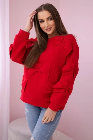 Insulated sweatshirt with decorative bows in red