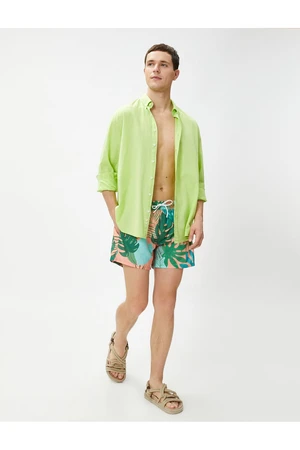 Koton Marine Shorts with a Tropical Print Tie Waist, Pocket Detailed.