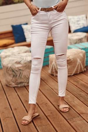 White denim jeans with holes