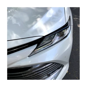 Car Headlight Eyebrow Eye Lid head light lamp Eyelids Cover Stcker Trim for Toyota Camry LE XLE SE XSE 2018-2021(Carbon)