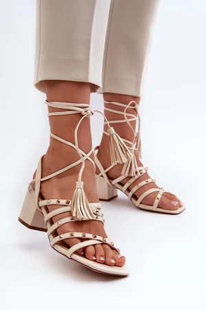 Beige low-heeled Chrisele studded sandals