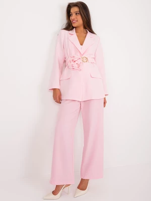 Light pink blazer with pink belt and flower