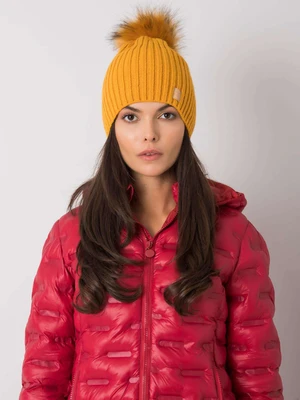 Dark yellow cap with pompom