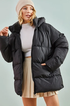 Bianco Lucci Women's Long puffer jacket with a Lace-up hood.