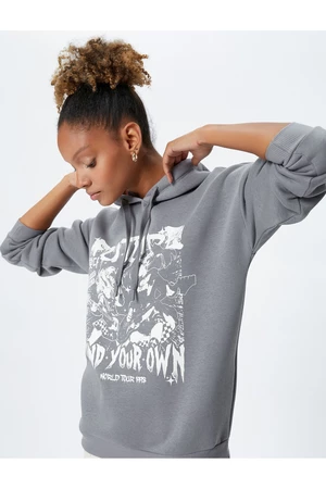 Koton Hooded Sweatshirt with a slogan printed, comfortable fit with long sleeves.