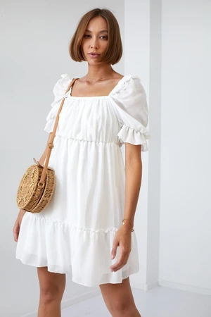 Simple cream dress with ruffles