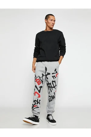 Koton Asian Print Jogger Sweatpants with a drawstring waist and pockets.