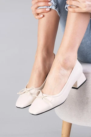 Mio Gusto Bellamy Beige Women's Short Heeled Shoes with Bow Detail.