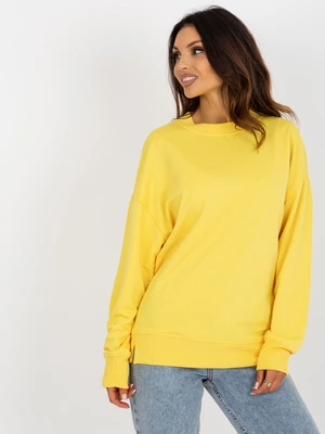 Yellow loose sweatshirt without hood with a round neckline