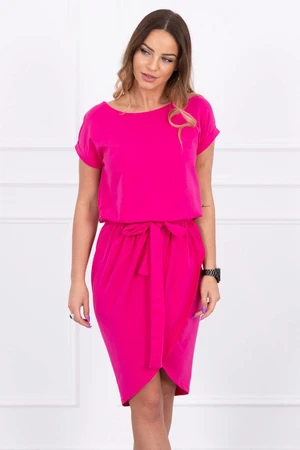 Tied dress with fuchsia clutch underneath