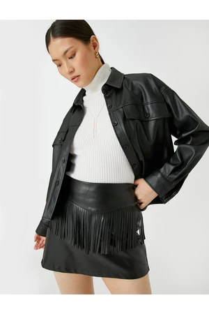 Koton Leather Look Mini Skirt with Tassel Detail.