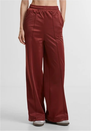 Women's trousers with creases on the sides in dark rust color