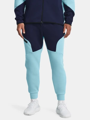 Modré sportovní tepláky Under Armour UA Unstoppable Flc Joggers