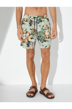 Koton Marine Shorts with Leaf Print. A drawstring waist with pockets.