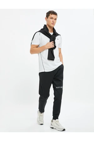 Koton Jogger Sweatpants with Pockets, Tie Waist and Print Detail.