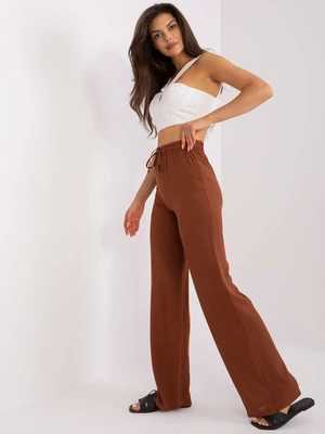 Brown fabric trousers with a high waist