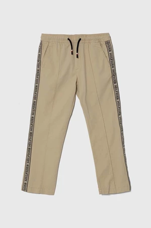 Dětské kalhoty Tommy Hilfiger béžová barva, s potiskem