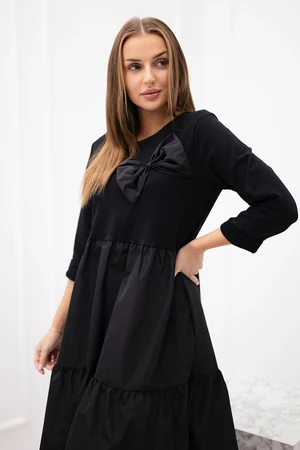 Black flared dress with bow