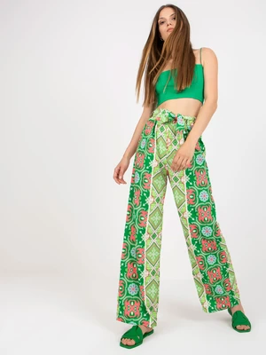 Green patterned fabric trousers with a wide leg