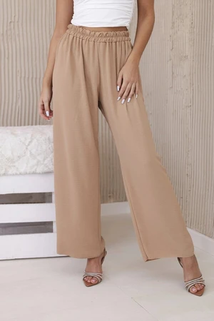 Brown trousers with wide legs