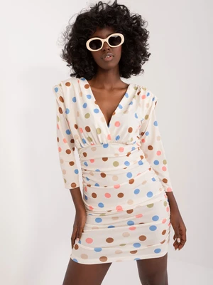 Cream fitted dress with polka dots