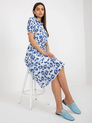 White and dark blue flowing floral dress with belt