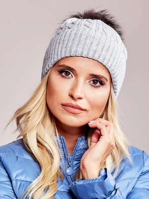 Grey hat with trim and fur pompom