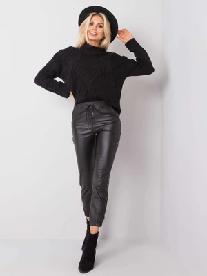 Black waxed trousers