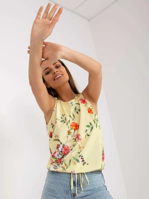 Yellow patterned top with neckline at back