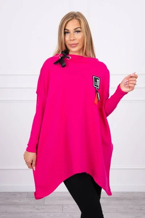 Oversize sweatshirt with asymmetrical sides of fuchsia color