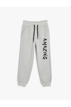 Koton Jogger Sweatpants with Tied Waist and Sports Print Detail