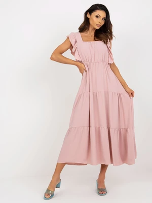 Light pink flowing dress with frills