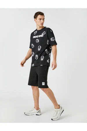 Koton Shorts with a tie-waist Slim Fit Shorts with Pockets and Printed Labels.