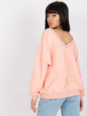 Light pink and black sweatshirt with oversize print