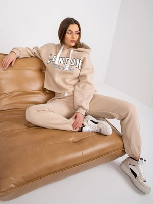 Beige tracksuit with Laraina lettering