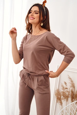 Women's jumpsuit fastened at the back with a cappuccino zip