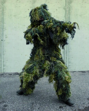 Maskovací oblek “Hejkal“ Ghillie Suit 4-dílný ANTI FIRE Mil-Tec® - woodland  (Barva: US woodland, Velikost: M - L)