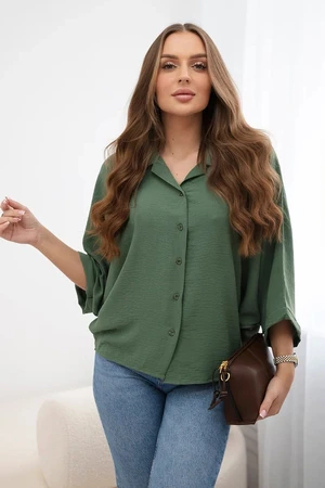 Oversized blouse with khaki button closure