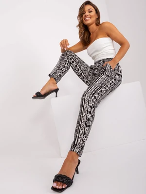 Black trousers made of fabric with SUBLEVEL patterns