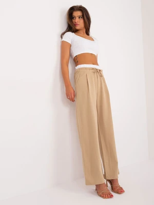 Brown fabric trousers with pockets