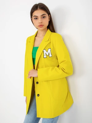 Lady's yellow jacket with patches