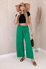 Kalhoty se širokým pasem zelené barvy