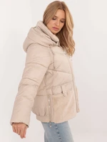 Brown quilted winter jacket with fur