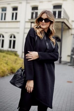 Oversized, padded tunic with asymmetrical trim, black