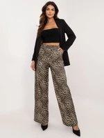 Beige and black patterned eco-leather trousers