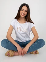 White women's solid color T-shirt with cutouts