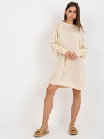 Light beige oversize knitted dress with long sleeves