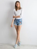 Blue denim shorts with patches