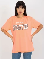 Fluo orange loose women's t-shirt with inscription