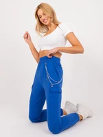 Cobalt blue sweatpants with an elastic waistband